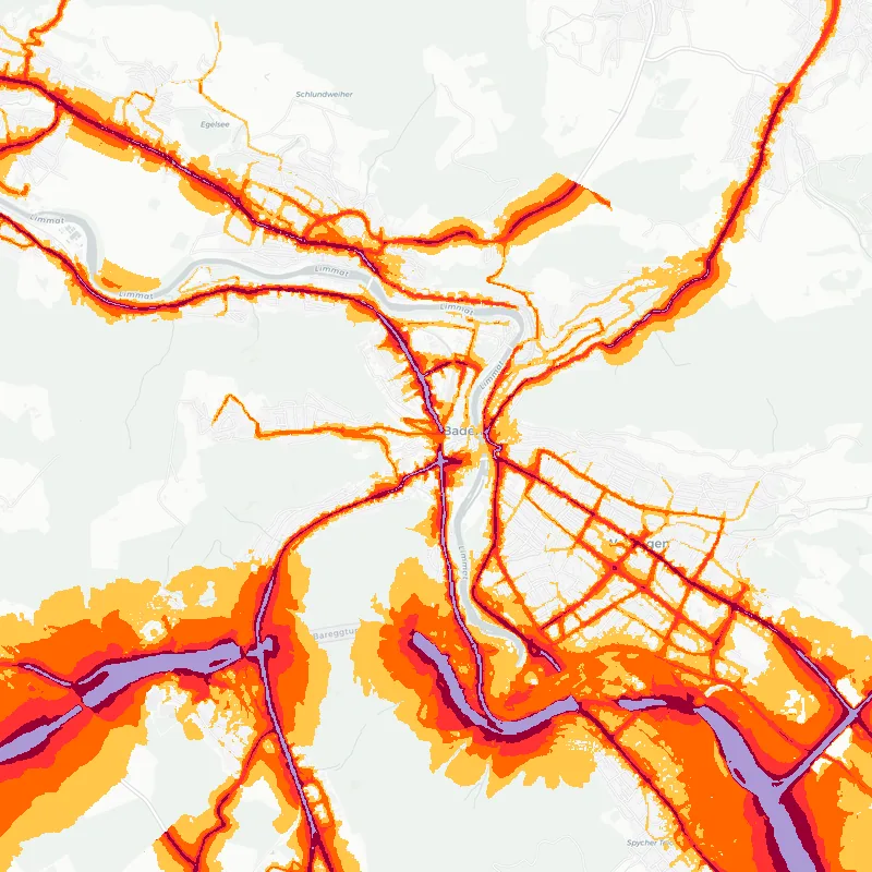 Noise map of Baden-Brugg, Switzerland: road-traffic noise contours from the EU strategic noise maps, shaded yellow (≈55 dB Lden) through orange and red to dark purple (≈75 dB+), over the city's street network.