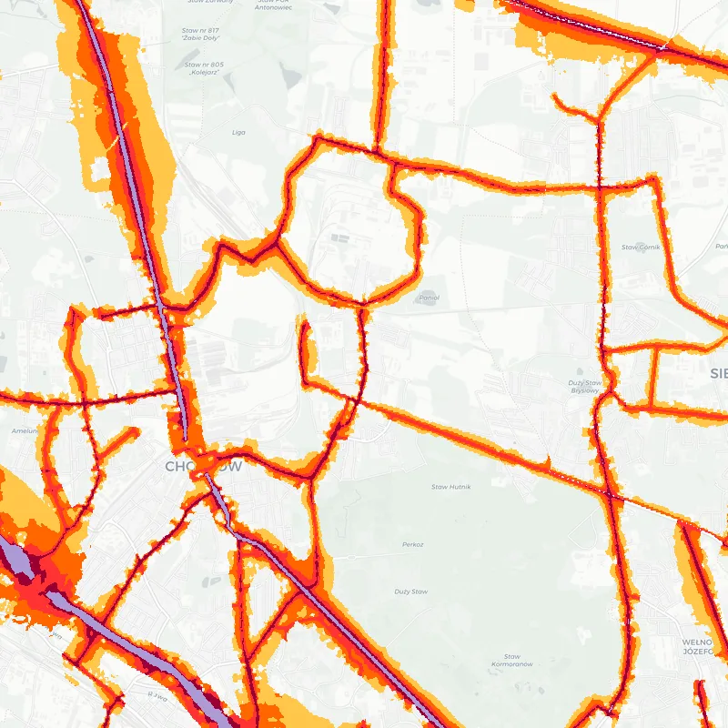 Noise map of Chorzow, Poland: road-traffic noise contours from the EU strategic noise maps, shaded yellow (≈55 dB Lden) through orange and red to dark purple (≈75 dB+), over the city's street network.