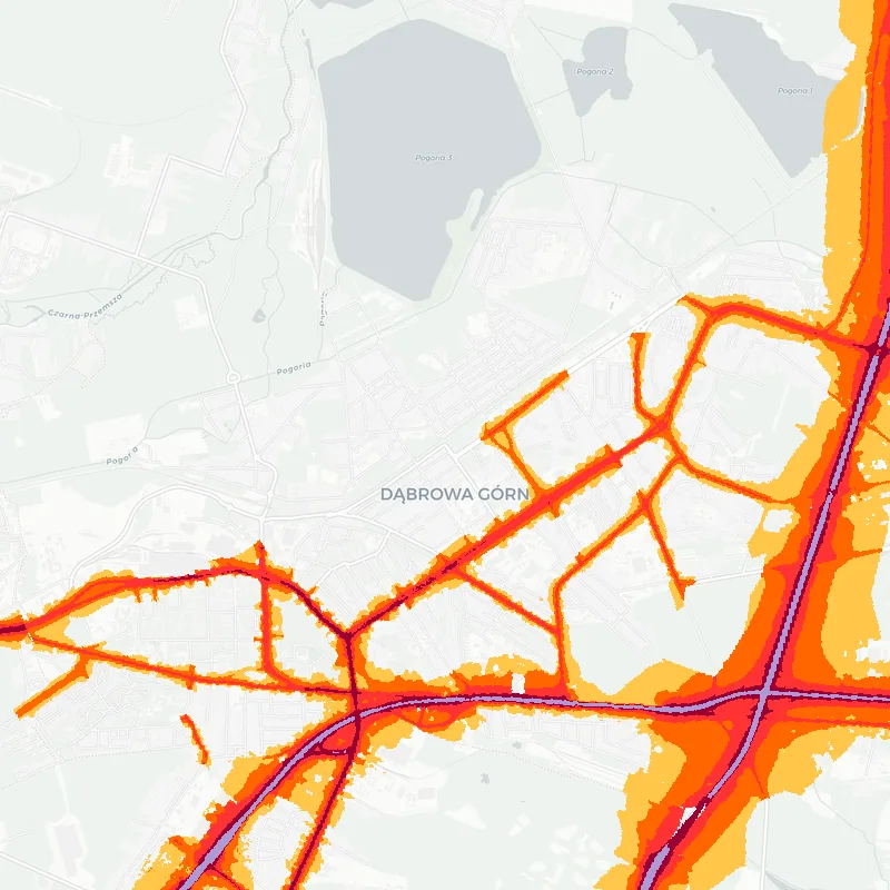 Noise map of Dabrowa Gornicza, Poland: road-traffic noise contours from the EU strategic noise maps, shaded yellow (≈55 dB Lden) through orange and red to dark purple (≈75 dB+), over the city's street network.