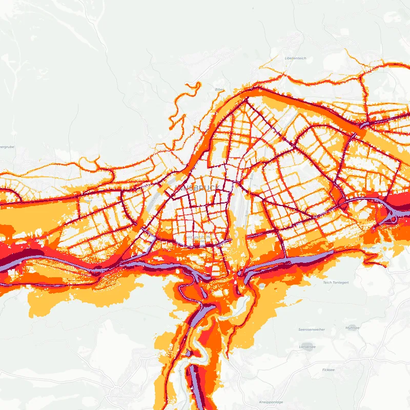 Noise map of Innsbruck, Austria: road-traffic noise contours from the EU strategic noise maps, shaded yellow (≈55 dB Lden) through orange and red to dark purple (≈75 dB+), over the city's street network.
