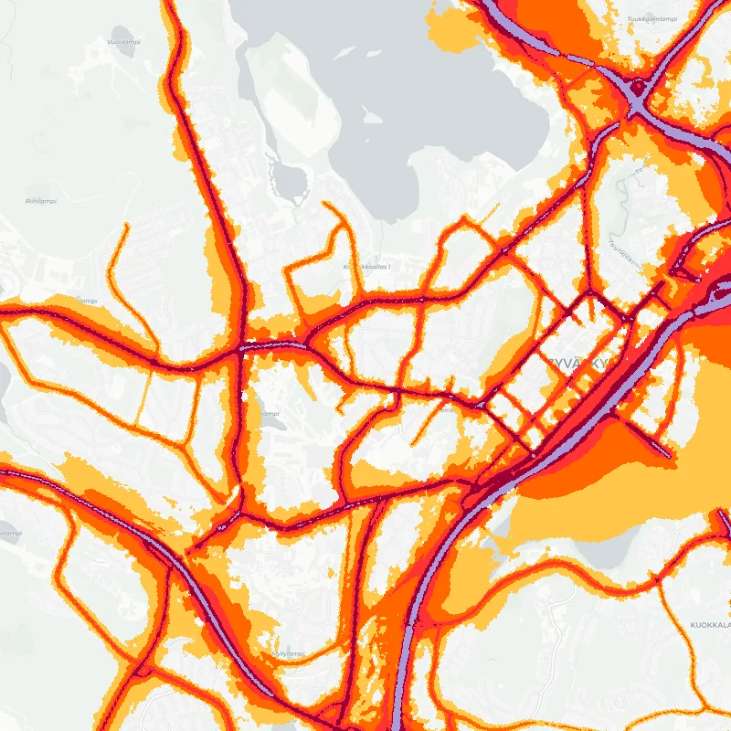 Noise map of Jyvaskyla, Finland: road-traffic noise contours from the EU strategic noise maps, shaded yellow (≈55 dB Lden) through orange and red to dark purple (≈75 dB+), over the city's street network.