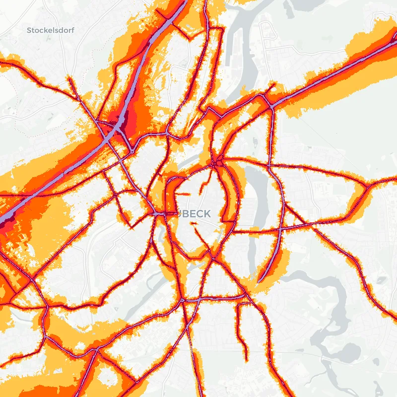 Noise map of Luebeck, Germany: road-traffic noise contours from the EU strategic noise maps, shaded yellow (≈55 dB Lden) through orange and red to dark purple (≈75 dB+), over the city's street network.