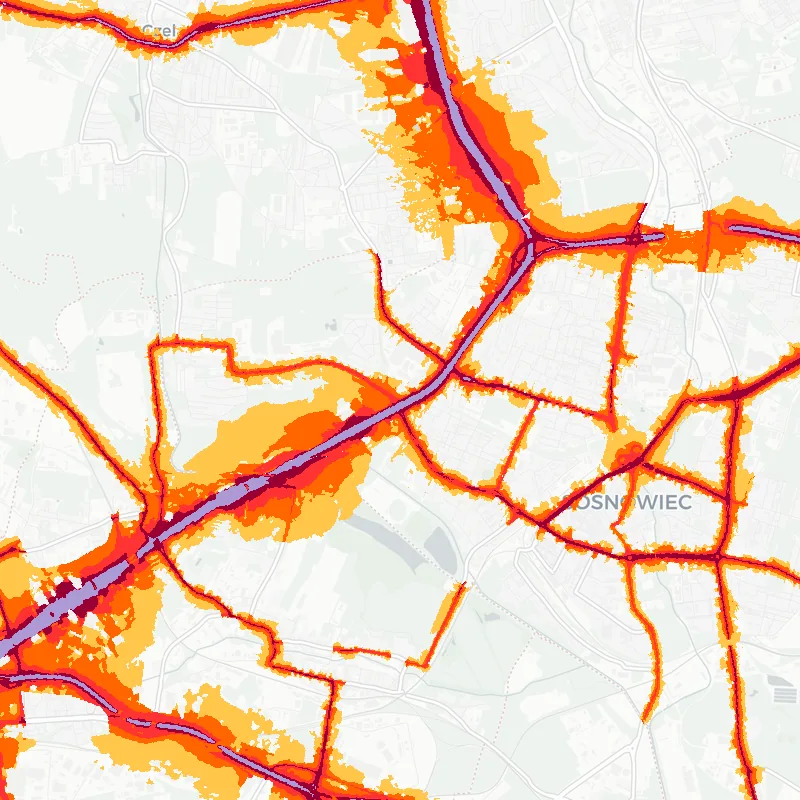 Noise map of Sosnowiec, Poland: road-traffic noise contours from the EU strategic noise maps, shaded yellow (≈55 dB Lden) through orange and red to dark purple (≈75 dB+), over the city's street network.